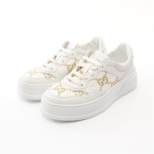 white and gold gucci shoes